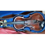 A late 19th/early 20th century violin with 2 piece back, stamped to rear Vuillaume a Paris, in