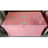 A 19th century pink painted pine bedding box and a leather suitcase