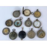 A selection of pocket watches and watch parts.