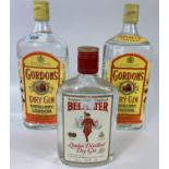 Two x 1 litre bottles of Gordon's gin and a half bottle of Beefeater gin