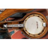 A Pre WWII Banjolele Dallas model E George Formby No 1031with mother of pearl inlay to fret and a