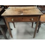 An 18th century Countrymade oak side table with frieze drawer and square legs