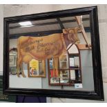 An early 20thC style CADBURY'S shop advertising mirror depicting a cow and lettered "CADBURY'S MILK