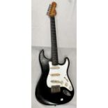 A 1962 Fender Stratocaster guitar with black body in hard case (in need of restoration) WITHDRAWN