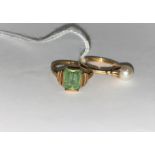 A dress ring set cushion cut green stone (worn), stamped '9ct', size M; a 9 carat hallmarked gold