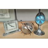 A vintage 'Sputnik' West German barometer, an Estyma egg clock and a chrome mantel clock