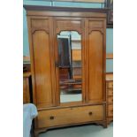 An Edwardian inlaid mahogany 3 piece bedroom suite in the Sheraton style comprising wardrobe,