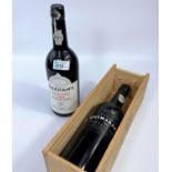 A bottle of Graham's Malvedos vintage port 1984; a bottle of Fonseca "Bin 27" in wooden box