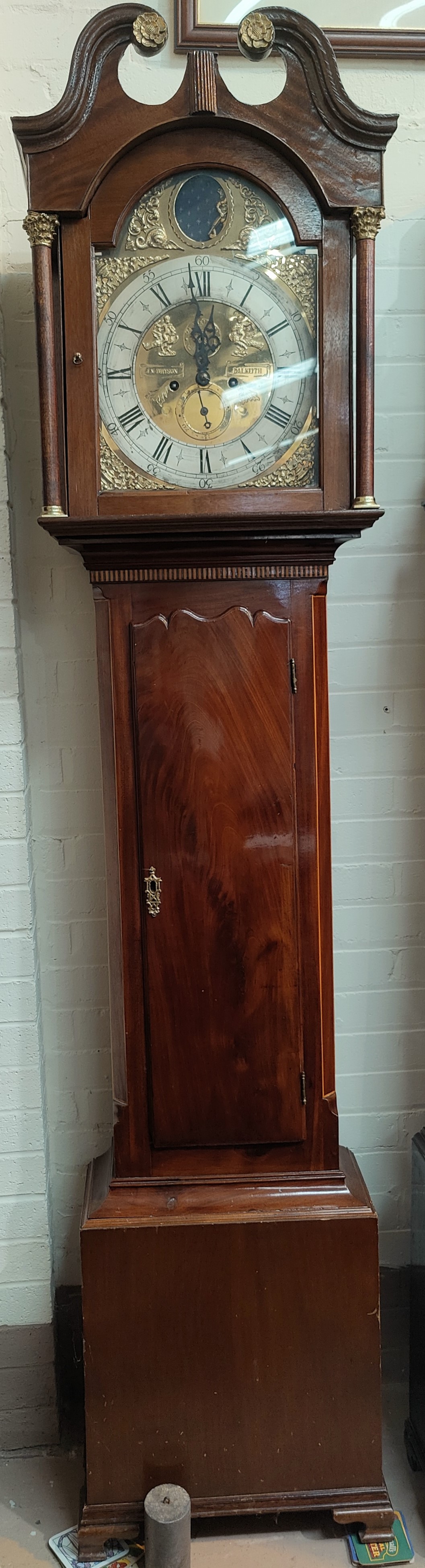 An 18th century inlaid mahogany long case clock with brass mounted swan neck pedestal and turned