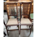 A 1950's walnut bookcase; 2 Edwardian bedroom chairs