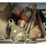 A selection of decorative metalware including brass chimes, kettles, hot-water bottles etc