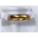 A 22 carat hallmarked gold wedding ring, 3.8 gm