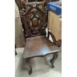 A 19th century shield back hall chair; 2 stick back armchairs; a mid 20th century telephone table