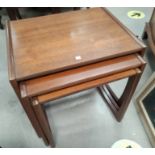A 1960's G-Plan teak nest of 3 occasional tables