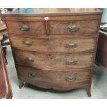 A George III mahogany bow front chest of 3 long and 2 short drawers with oval drop handles, on splay