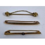 A 9 carat hallmarked gold plain bar brooch, 1.7 gm; a similar set with a small stone, stamped '