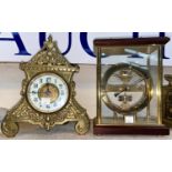 An Edwardian mantel clock in ornate brass case; a desk top barometer a modern 'Hugo Metobar'