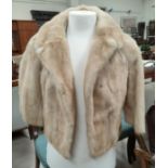 A short honey mink jacket with 3/4 length sleeves, size 12 / 14