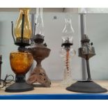 Four Various oil lamps