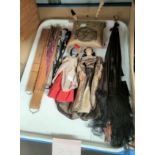 A Victorian black silk parasol; a selection of fans; 2 19th century cloth dolls; a pin cushion