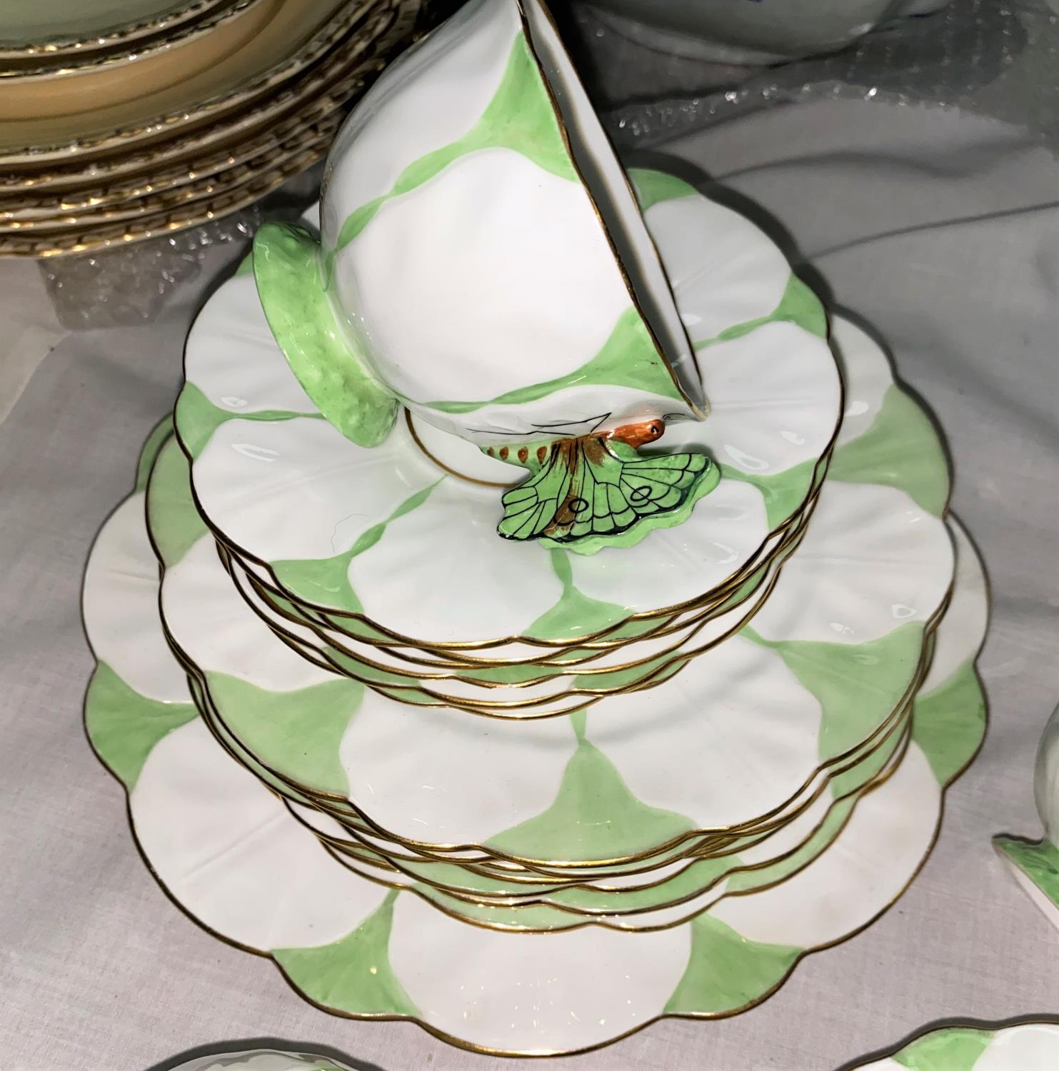 A 1930's Aynsley butterfly part tea service having 7 cups, 10 saucers, 7 side plates, a cake plate - Image 2 of 3