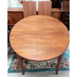 A 1960's dining suite comprising G-Plan teak extending table with 2 leaves, extended length 260