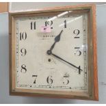 A 1930's Garrard oak cased square dial wall clock with timepiece movement