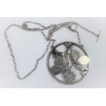 A George Jensen silver pendant designed by Arno Malinowski: 2 butterflies perched on flowering