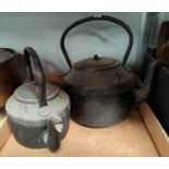 A 19th century copper kettle; a brass and 2 cast iron kettles