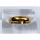 A 22 carat hallmarked gold wedding ring, 5.8 gm