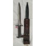 A knife Bayonet, with steel handle and offset sprung clip, steel and leather scabbard; blade 21cm.