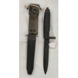 A modern Bayonet with black plastic and webbing sheath, blade 16.5cm