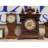 A mantel clock in Art Nouveau carved oak case, with French drum movement, height 30; an Edwardian