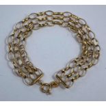 A modern yellow metal gate bracelet, stamped '375', 4.8 gm