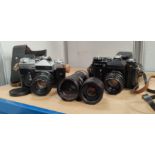 2 vintage "Zenit" SLR cameras, bag of spare lenses etc