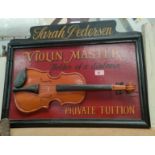 A painted relief sig: "Violin Master"