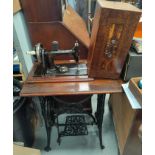 A 19th century treadle sewing machine by Seidel and Naumann, with ornate cast iron base, 74 cm
