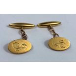 An 18 carat hallmarked gold pair of cufflinks, monogrammed, 14.2 gm