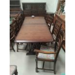 A Priory period style oak dining suite comprising extending table, 8 chairs (6 + 2), and court