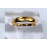 A 22 carat hallmarked gold wedding ring, 4.3 gm