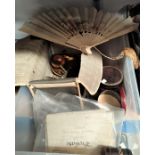 A painted fan; a boxed geometry set; old documents; opera glasses; etc.