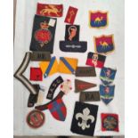 A collection of British army cloth badges