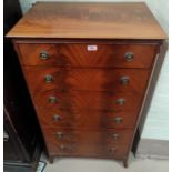 A reproduction figured mahogany 6 height chest of drawers