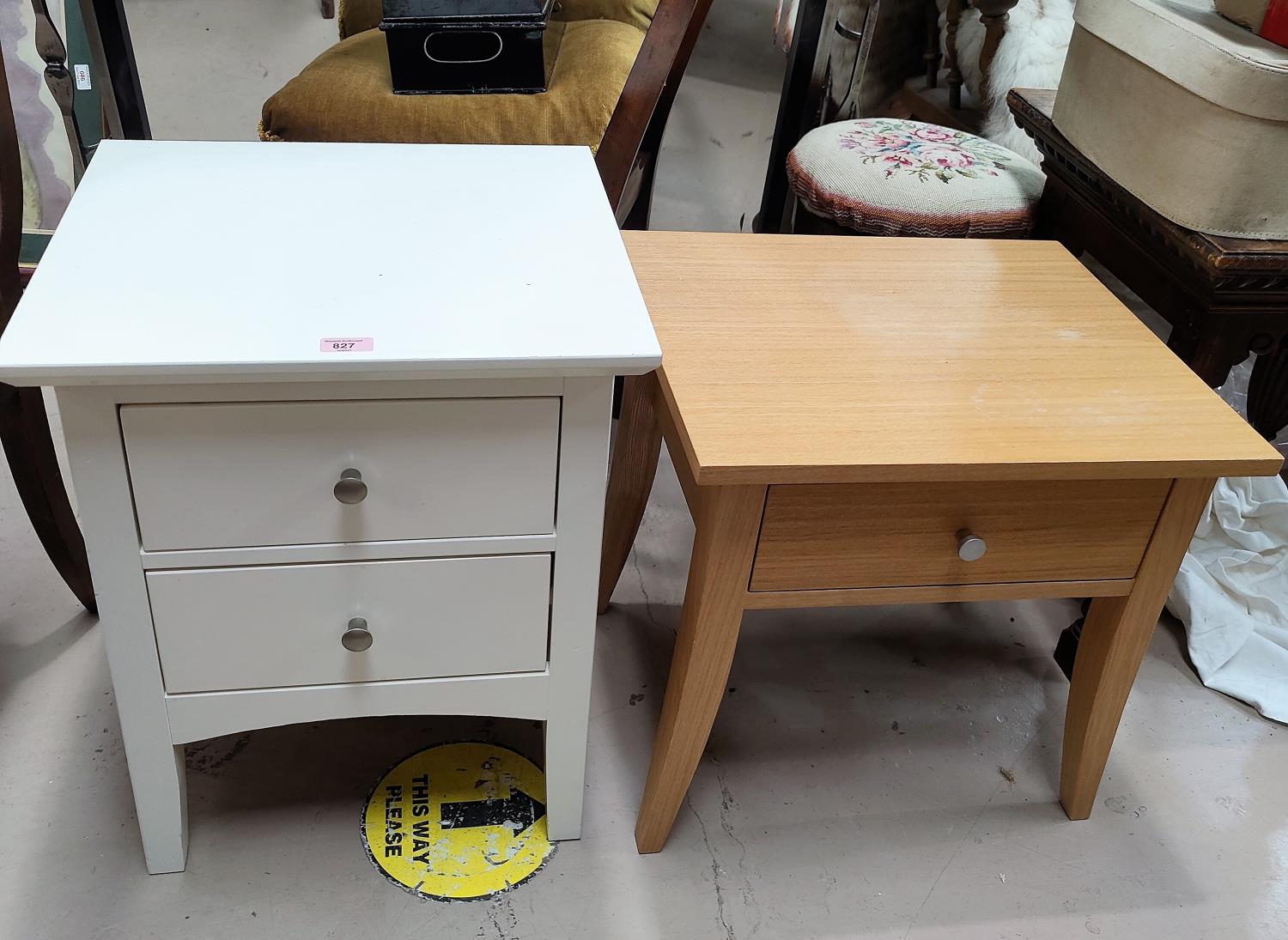 A 2-height bedside cabinet in white finish and a similar lightwood cabinet