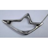 A Georg Jensen silver brooch designed by Henning Koppel, openwork abstract form, marks stamped,