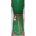 A Victorian table top "Bar Bagatelle" on mahogany folding board, with cues and balls