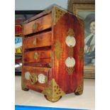 A miniature oriental 4 height chest/jewellery box, with brass and jade coloured mounts.