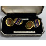 A Pair of 'QEGS' Queen Elizabeth's Grammar School Blackburn's gold plated and enamel cufflinks, with