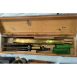 A brass Library Telescope, single drawer mounted on folding tripod stand, 55cm (closed), boxed
