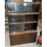 A MINTY 4 height bookcase, glass sliding doors, 89cm